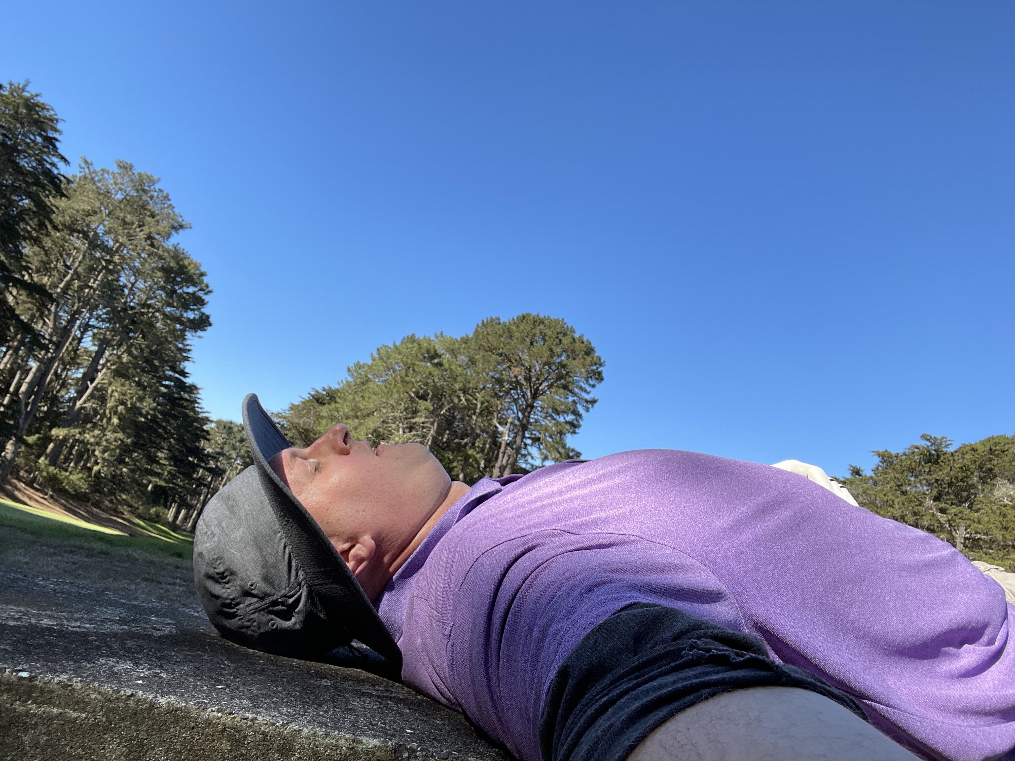 laying down in the grass enjoying the day